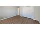 Bedroom featuring hardwood floors and neutral walls at 2416 Centennial Hill Nw Way, Acworth, GA 30102