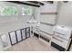 Bright living room features white walls, dark beams and floor to ceiling windows at 2726 Talley Ln, Buford, GA 30519