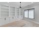 Bright office with built-in shelving and soft, natural light streaming through window at 2726 Talley Ln, Buford, GA 30519