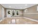 Finished basement featuring tile flooring, recessed lighting and access to the outdoors at 1048 Standard Ne Dr, Brookhaven, GA 30319