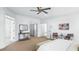 Spacious main bedroom with neutral colors, adjoining sitting room, and ample closet space at 1048 Standard Ne Dr, Brookhaven, GA 30319