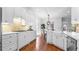 Spacious white kitchen featuring stainless steel appliances and an open layout at 1048 Standard Ne Dr, Brookhaven, GA 30319