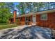 A close-up of the patio, complete with a grill and access to the home's exterior door at 2396 Midvale Cir, Tucker, GA 30084