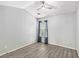 Bedroom with vaulted ceilings, a ceiling fan and hardwood floors at 4440 Spring Mtn Ln, Powder Springs, GA 30127