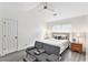 Cozy bedroom with vaulted ceilings, a ceiling fan and hardwood floors at 4440 Spring Mtn Ln, Powder Springs, GA 30127