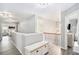Upstairs hallway with seating and access to bedrooms at 4440 Spring Mtn Ln, Powder Springs, GA 30127