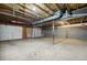 Unfinished basement with exposed beams, ductwork, and concrete floor at 21 Misty Hollow Ct, Euharlee, GA 30145