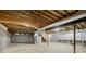 Unfinished basement with exposed beams, ductwork, and concrete floor at 21 Misty Hollow Ct, Euharlee, GA 30145