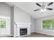 Inviting living room featuring a fireplace and bright windows for a cozy atmosphere at 21 Misty Hollow Ct, Euharlee, GA 30145