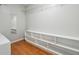 Walk-in closet with shelving and hardwood floors, ready for organizing your wardrobe at 225 Bayswater Dr, Suwanee, GA 30024