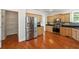 Eat-in kitchen features stainless steel appliances, granite countertops and pantry at 225 Bayswater Dr, Suwanee, GA 30024