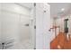 Functional laundry room with shelving and tile flooring, conveniently located on the upper floor at 225 Bayswater Dr, Suwanee, GA 30024