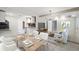 Open concept space features dining and living area with tile flooring at 225 Bayswater Dr, Suwanee, GA 30024