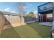 Spacious backyard with a privacy fence and potential for outdoor entertaining at 230 Woodward Se Ave, Atlanta, GA 30312