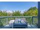 Relaxing balcony featuring outdoor seating and a view of the surrounding greenery at 230 Woodward Se Ave, Atlanta, GA 30312