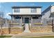 Charming two-story home with a welcoming front porch and attractive curb appeal at 230 Woodward Se Ave, Atlanta, GA 30312