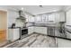 Modern kitchen equipped with stainless steel appliances and granite countertops at 230 Woodward Se Ave, Atlanta, GA 30312