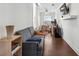Bright living room offers hardwood floors and a comfortable area for relaxation and work at 230 Woodward Se Ave, Atlanta, GA 30312