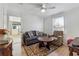 A cozy living room featuring wood floors, comfortable seating, and plenty of natural light at 230 Woodward Se Ave, Atlanta, GA 30312