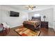 Charming main bedroom featuring hardwood floors and a cozy atmosphere for relaxation at 230 Woodward Se Ave, Atlanta, GA 30312