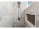 Modern shower featuring stone-look tile, shower head and convenient inset soap and shampoo storage at 230 Woodward Se Ave, Atlanta, GA 30312