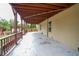 Expansive back porch with a wooden ceiling, offering ample space for outdoor entertainment and relaxation at 3770 Falling Leaf Ln, Cumming, GA 30041