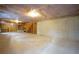 Large unfinished basement featuring concrete floor, exposed ceiling, and framed walls for future expansion at 3770 Falling Leaf Ln, Cumming, GA 30041