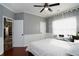 Bedroom featuring natural light, and access to a walk-in closet at 3770 Falling Leaf Ln, Cumming, GA 30041