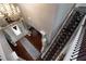 Elegant foyer features a chandelier, staircase, and an inviting entrance with a decorative front door at 3770 Falling Leaf Ln, Cumming, GA 30041