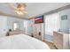 Comfortable bedroom with coastal decor features carpet flooring and lots of natural light at 582 Linda Ln, Powder Springs, GA 30127