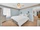 Comfortable bedroom with coastal decor features carpet flooring and lots of natural light at 582 Linda Ln, Powder Springs, GA 30127
