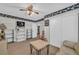 Spacious living room with large sofa and plenty of light at 582 Linda Ln, Powder Springs, GA 30127