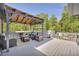 Inviting patio with covered seating and a grill for outdoor entertaining at 582 Linda Ln, Powder Springs, GA 30127