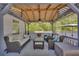 Inviting patio with covered seating and a grill for outdoor entertaining at 582 Linda Ln, Powder Springs, GA 30127