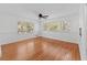 Bright and airy bedroom featuring hardwood floors and large windows offering tranquil views at 964 Crane Ne Rd, Atlanta, GA 30324
