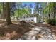 Sprawling single Gathering home with a driveway leading up to a well-maintained front yard at 964 Crane Ne Rd, Atlanta, GA 30324