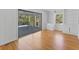 Cozy living room with built in cabinets, shelving and a sliding glass door for indoor-outdoor living at 964 Crane Ne Rd, Atlanta, GA 30324