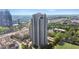 High-rise condominium with a stunning aerial view of the city and surrounding greenery at 795 Hammond Dr # 2101, Atlanta, GA 30328