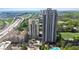 High-rise condominiums with a stunning aerial view of the city and surrounding greenery at 795 Hammond Dr # 2101, Atlanta, GA 30328