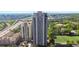High-rise condominium with a stunning aerial view of the city and surrounding greenery at 795 Hammond Dr # 2101, Atlanta, GA 30328