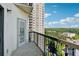 Balcony view highlighting cityscape, green trees, and upper-floor living at 795 Hammond Dr # 2101, Atlanta, GA 30328