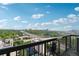 Balcony showcasing views of the cityscape, highway, and verdant tree line at 795 Hammond Dr # 2101, Atlanta, GA 30328
