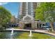 Park Towers building exterior with fountain and lush landscaping at 795 Hammond Dr # 2101, Atlanta, GA 30328