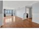 Bright living area with hardwood floors, and access to a balcony with a view at 795 Hammond Dr # 2101, Atlanta, GA 30328