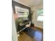 Cozy home office featuring a desk, lamp, modern decor, and ample natural light at 4440 Webb Bridge Rd, Alpharetta, GA 30005