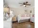 Cozy bedroom featuring a comfortable daybed and charming decor at 57 Glenn Eagles Way, Hiram, GA 30141