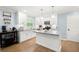 Kitchen with white cabinets, granite countertops, stainless steel appliances, and a coffee station at 57 Glenn Eagles Way, Hiram, GA 30141
