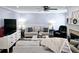 Inviting living room features a fireplace, plush seating, and stylish decor at 57 Glenn Eagles Way, Hiram, GA 30141