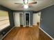 Bedroom featuring three doors and hardwood flooring ready for refurbishment at 2273 Childress Dr, Atlanta, GA 30311