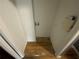 Small laundry area with hookups and wood floor in need of repair or replacement at 2273 Childress Dr, Atlanta, GA 30311